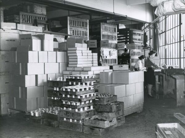 Black and white images of a pile of boxes with compass material