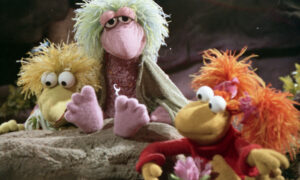 Three fraggles hanging out.