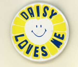 "DAISY LOVES ME" Button. Students had a hate/love relationship with the overworked computer. (RG 63.71)
