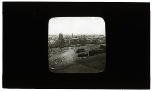 Black and white glass lantern slide in a wooden frame circa the 1890s. Handwritten on the frame is “Panorama of Cairo” suggesting the use of magic lanterns to create panorama-like effects.