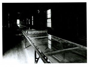 Nitrate film production table, early 20th-century. Plant design had to accommodate the production of hazardous flexible cellulose nitrate film base, which was cast on 200-ft long tables such as this one.