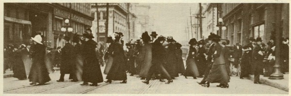 Shoppers at the crosswalk between Eaton's and Simpsons. [ca. 1905]. Image from: "The Simpsons Century." (Toronto, Ontario: Toronto Star Limited, 1972).