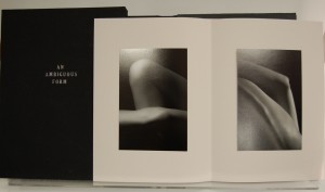 Double page spread, 2 black and white photos of abstract figure studies