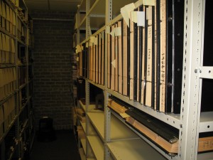 Kodak ledgers on shelving in Archives
