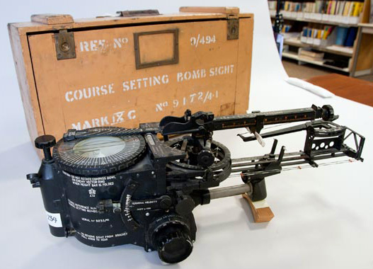 WWII Course Setting Bomb Sight, Mark IX C and original carry case. (TMU Archives, ArchivesDept-35), image