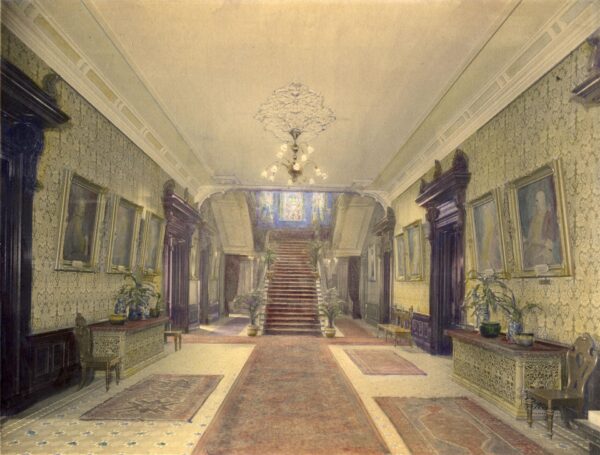 Interior view of Government House looking down hallway to staircase at end.