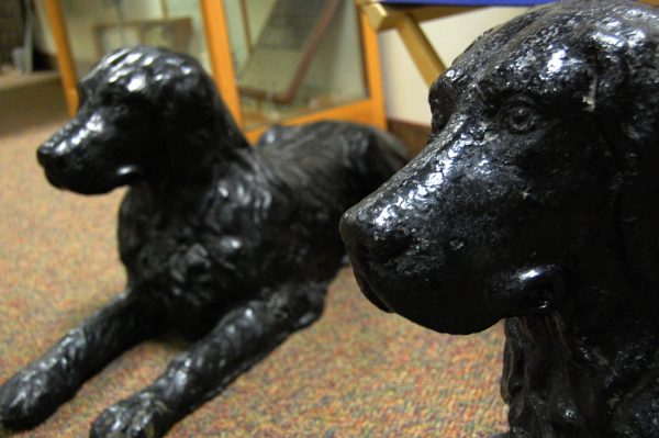 Two cast iron dog sculptures