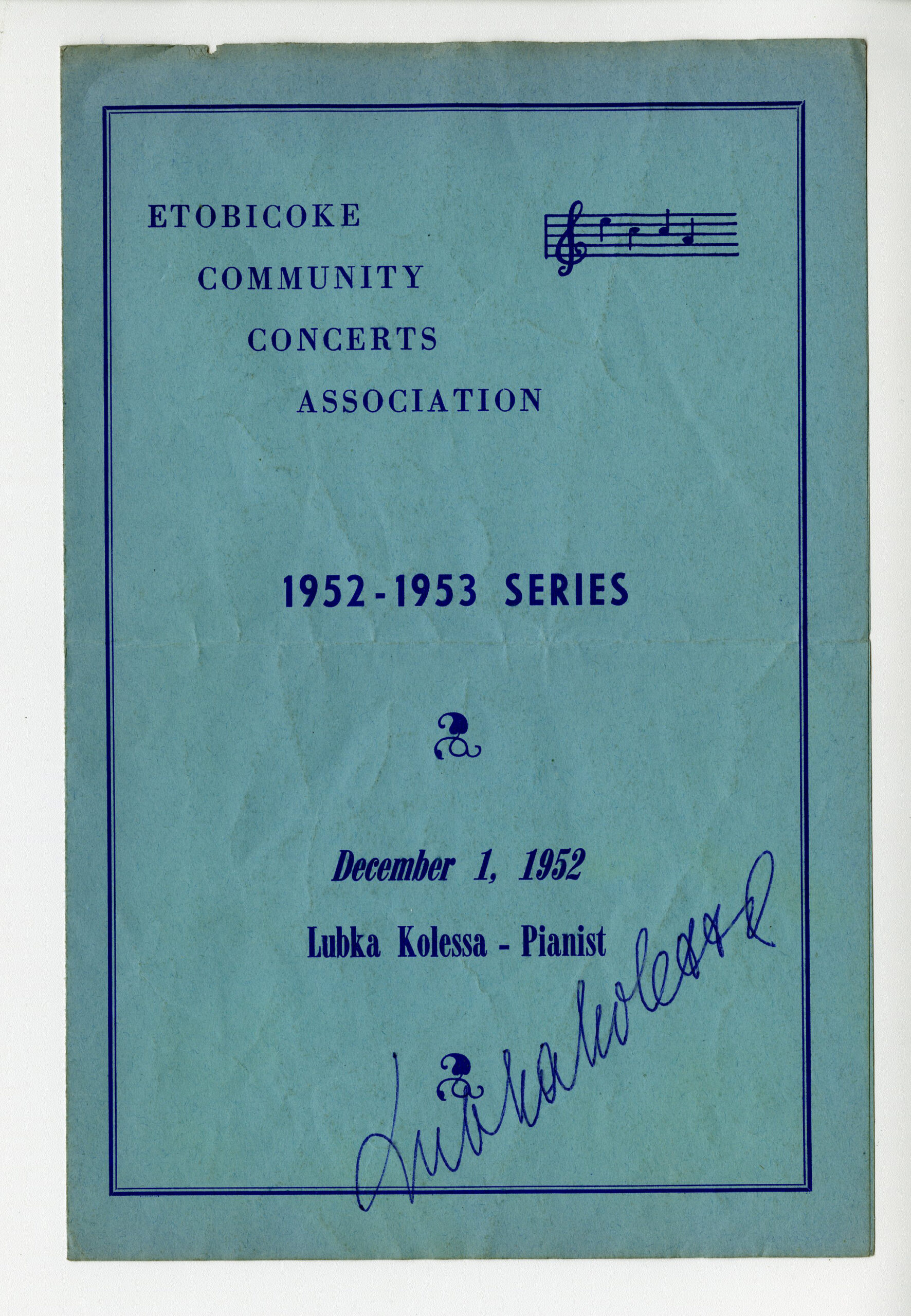 A theatre programme with a blue cover, signed the artist.