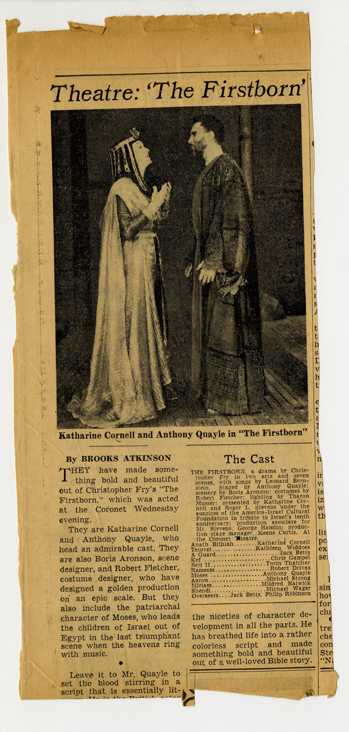 A newspaper clipping from The Firstborn, featuring commentary on the play and a cast photograph.