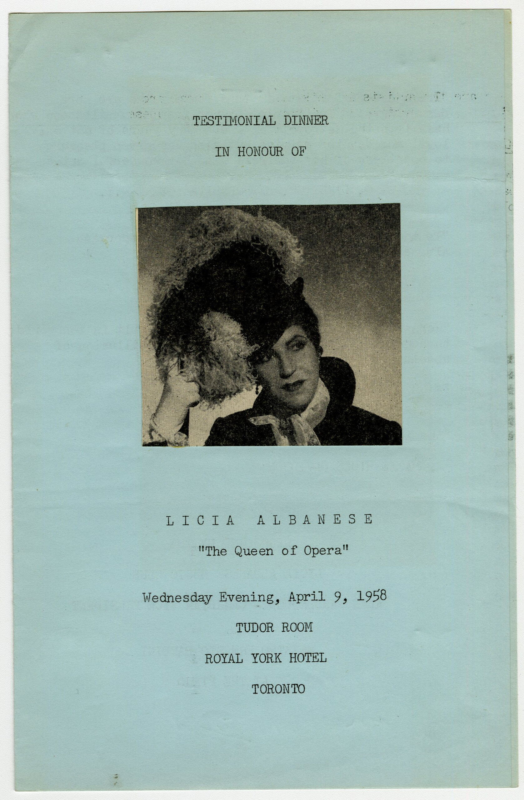 A blue program for a concert with a picture of Licia Albanese in the centre.