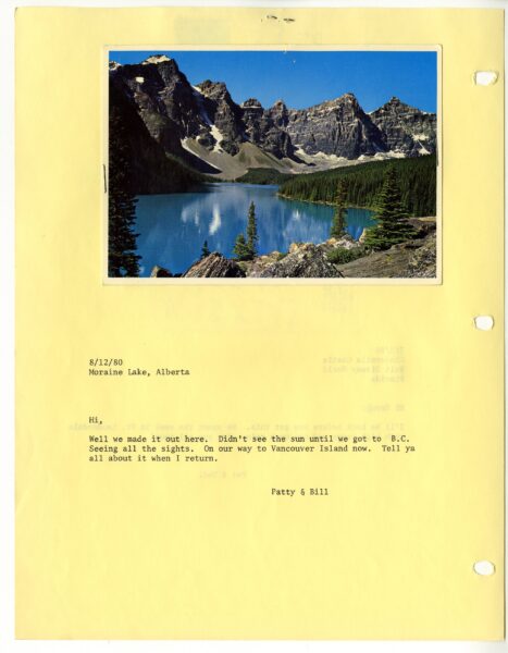 A yellow page from a scrapbook with a postcard of Moraine Lake in Alberta. Text on the page says "Hi, Well we made it here. Didn't see the sun until we got to B.C. Seeing all the sights. On our way to Vancouver Island Now. Tell ya all about it when I return. Patty & Bill."