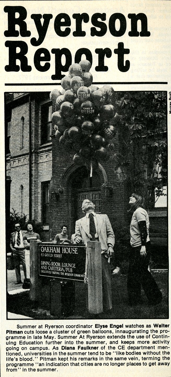 President Walter Pitman releasing balloons in the air while other look on