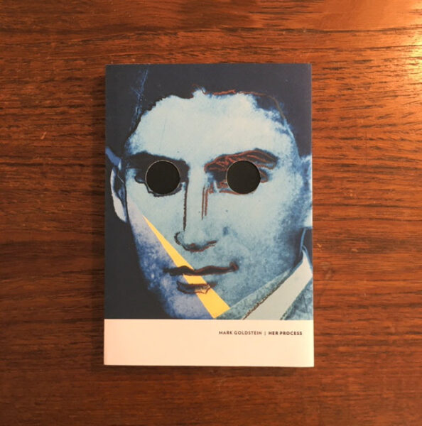 Book cover featuring a photograph of Franz Kafka with the eyes cut out in circles. 