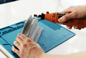 DME lab user operating rotary tool.